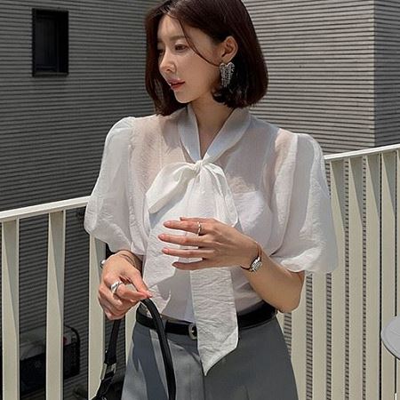 A selection of Dongdaemum Women’s Shirts & Tops, showcasing the best of Korean fashion.