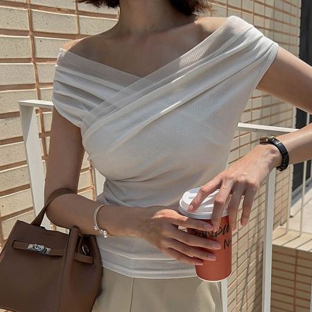 A selection of Dongdaemum Women’s Shirts & Tops, showcasing the best of Korean fashion.