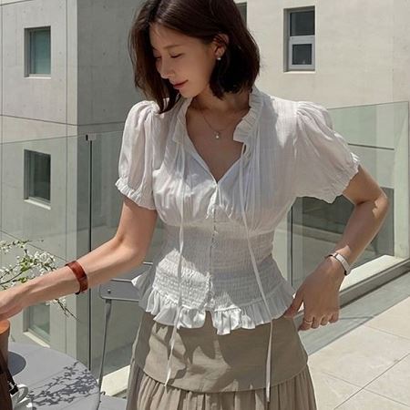 A selection of Dongdaemum Women’s Shirts & Tops, showcasing the best of Korean fashion.