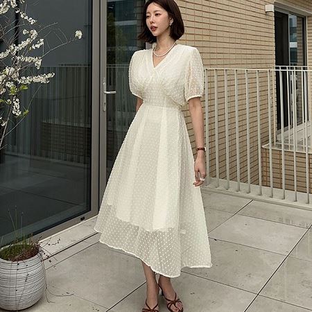 A collection of Dongdaemum Women’s Dresses, encapsulating the charm of Korean fashion.