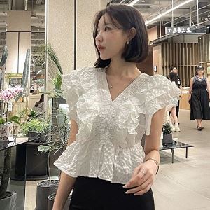 A selection of Dongdaemum Women’s Shirts & Tops, showcasing the best of Korean fashion.