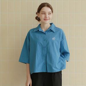 A selection of Dongdaemum Women’s Shirts & Tops, showcasing the best of Korean fashion.