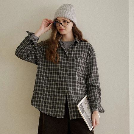 A selection of Dongdaemum Women’s Shirts & Tops, showcasing the best of Korean fashion.