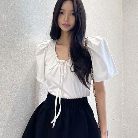 A selection of Dongdaemum Women’s Shirts & Tops, showcasing the best of Korean fashion.