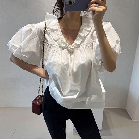 A selection of Dongdaemum Women’s Shirts & Tops, showcasing the best of Korean fashion.