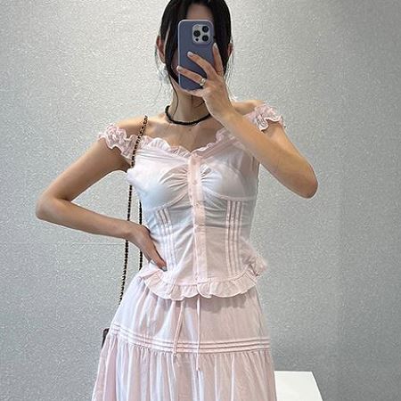 A selection of Dongdaemum Women’s Shirts & Tops, showcasing the best of Korean fashion.