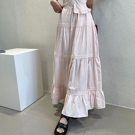 A collection of Dongdaemum Women’s Dresses, encapsulating the charm of Korean fashion.