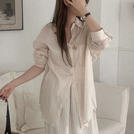 A selection of Dongdaemum Women’s Shirts & Tops, showcasing the best of Korean fashion.