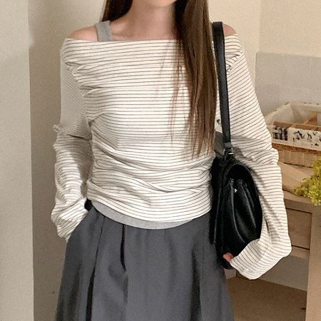 A selection of Dongdaemum Women’s Shirts & Tops, showcasing the best of Korean fashion.