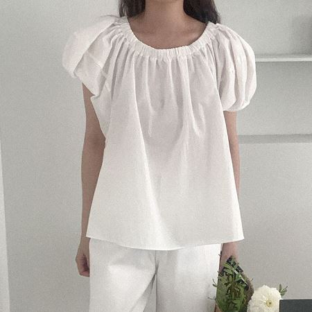 A selection of Dongdaemum Women’s Shirts & Tops, showcasing the best of Korean fashion.