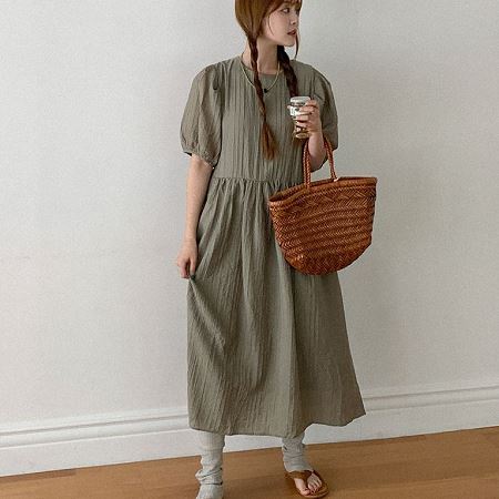 A collection of Dongdaemum Women’s Dresses, encapsulating the charm of Korean fashion.