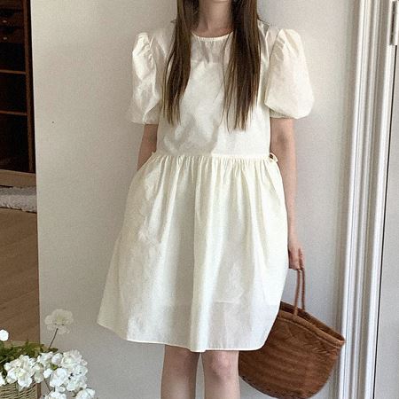 A collection of Dongdaemum Women’s Dresses, encapsulating the charm of Korean fashion.