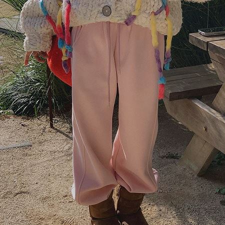 An array of Dongdaemum Women’s Pants, embodying the versatility of Korean fashion.