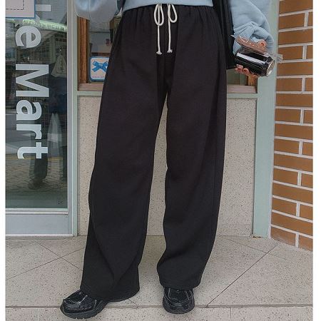 An array of Dongdaemum Women’s Pants, embodying the versatility of Korean fashion.