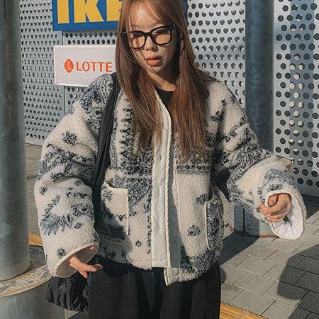 A variety of Dongdaemum Women’s Coats & Jackets, reflecting the sophistication of Korean fashion.