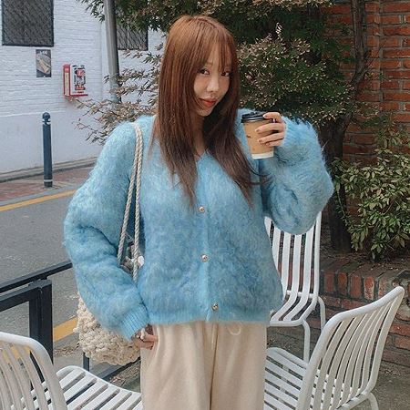 A variety of Dongdaemum Women’s Coats & Jackets, reflecting the sophistication of Korean fashion.