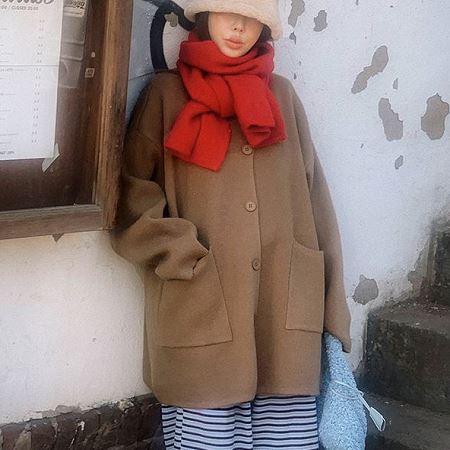 A variety of Dongdaemum Women’s Coats & Jackets, reflecting the sophistication of Korean fashion.