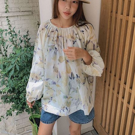 A selection of Dongdaemum Women’s Shirts & Tops, showcasing the best of Korean fashion.