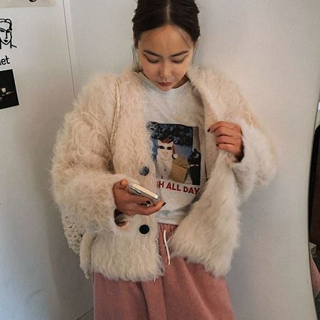 A variety of Dongdaemum Women’s Coats & Jackets, reflecting the sophistication of Korean fashion.