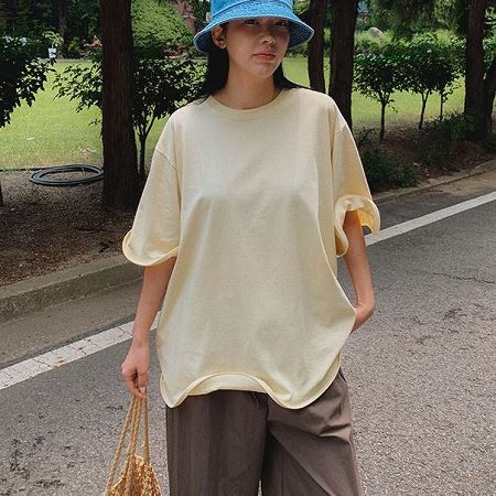 A selection of Dongdaemum Women’s Shirts & Tops, showcasing the best of Korean fashion.