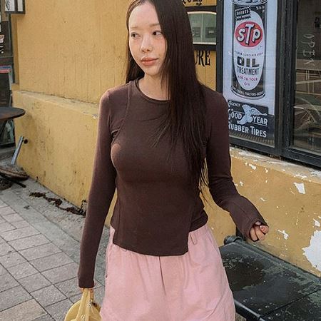 A selection of Dongdaemum Women’s Shirts & Tops, showcasing the best of Korean fashion.