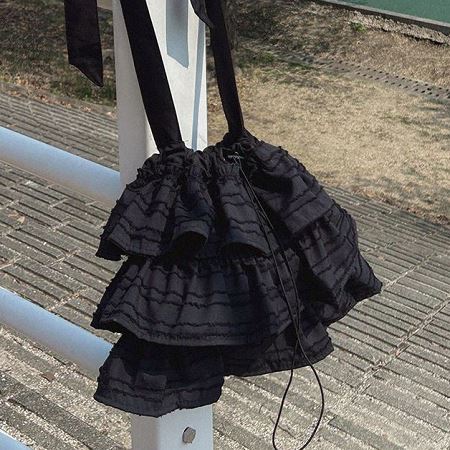 A collection of Dongdaemum Women’s Handbags, Wallets & Cases, showcasing the elegance of Korean fashion.