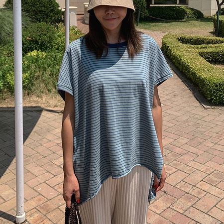 A selection of Dongdaemum Women’s Shirts & Tops, showcasing the best of Korean fashion.