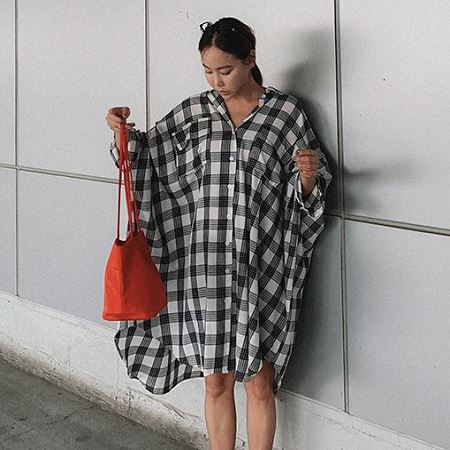 A selection of Dongdaemum Women’s Shirts & Tops, showcasing the best of Korean fashion.