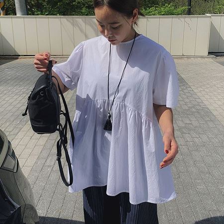 A selection of Dongdaemum Women’s Shirts & Tops, showcasing the best of Korean fashion.