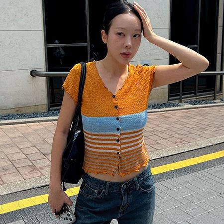 A selection of Dongdaemum Women’s Shirts & Tops, showcasing the best of Korean fashion.