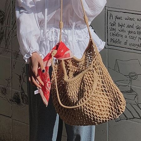 A collection of Dongdaemum Women’s Handbags, Wallets & Cases, showcasing the elegance of Korean fashion.