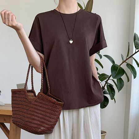 A selection of Dongdaemum Women’s Shirts & Tops, showcasing the best of Korean fashion.