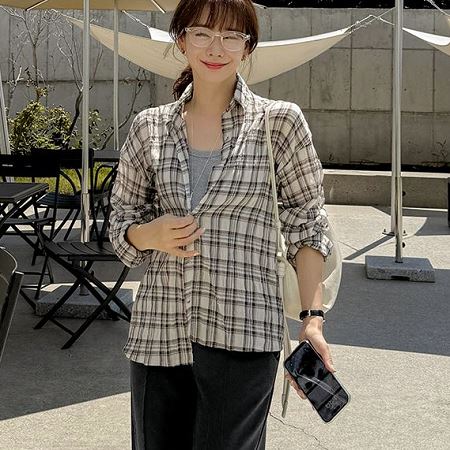 A selection of Dongdaemum Women’s Shirts & Tops, showcasing the best of Korean fashion.