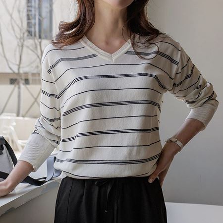 A selection of Dongdaemum Women’s Shirts & Tops, showcasing the best of Korean fashion.