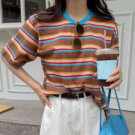 A selection of Dongdaemum Women’s Shirts & Tops, showcasing the best of Korean fashion.