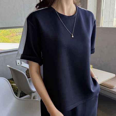 A selection of Dongdaemum Women’s Shirts & Tops, showcasing the best of Korean fashion.
