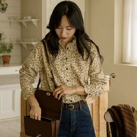 A selection of Dongdaemum Women’s Shirts & Tops, showcasing the best of Korean fashion.