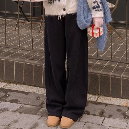An array of Dongdaemum Women’s Pants, embodying the versatility of Korean fashion.