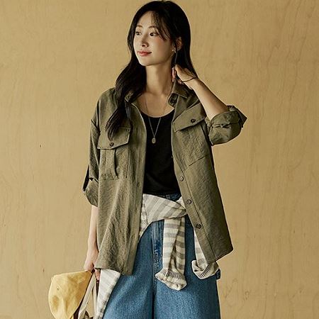 A selection of Dongdaemum Women’s Shirts & Tops, showcasing the best of Korean fashion.