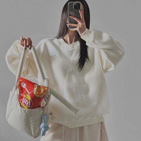 Dongdaemum Women’s Shirts, Tops & T-Shirts, a testament to the elegance and quality of wholesale Korean fashion.