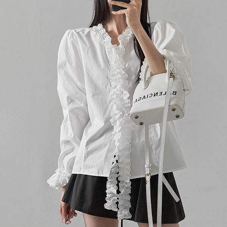 Dongdaemum Women’s Shirts, Tops & T-Shirts, a testament to the elegance and quality of wholesale Korean fashion.
