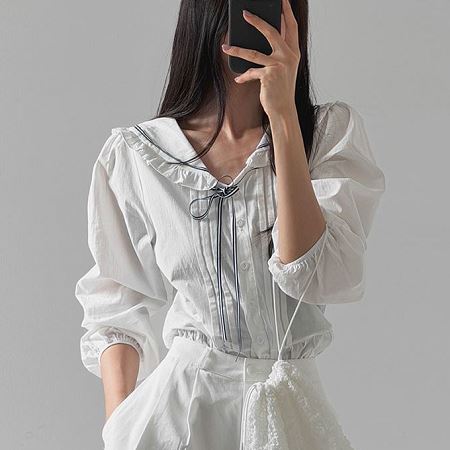 Dongdaemum Women’s Shirts, Tops & T-Shirts, a testament to the elegance and quality of wholesale Korean fashion.