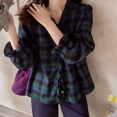 A selection of Dongdaemum Women’s Shirts & Tops, showcasing the best of Korean fashion.