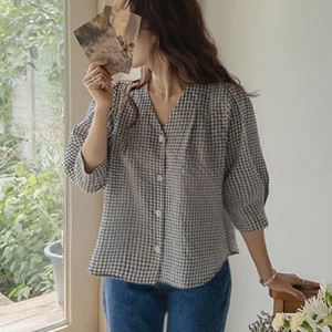 A selection of Dongdaemum Women’s Shirts & Tops, showcasing the best of Korean fashion.