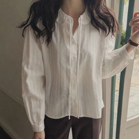 A selection of Dongdaemum Women’s Shirts & Tops, showcasing the best of Korean fashion.