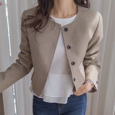 A variety of Dongdaemum Women’s Coats & Jackets, reflecting the sophistication of Korean fashion.