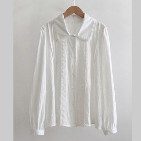 A selection of Dongdaemum Women’s Shirts & Tops, showcasing the best of Korean fashion.
