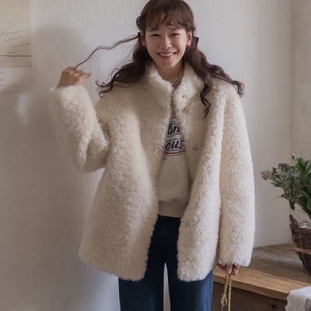 A variety of Dongdaemum Women’s Coats & Jackets, reflecting the sophistication of Korean fashion.