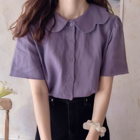 A selection of Dongdaemum Women’s Shirts & Tops, showcasing the best of Korean fashion.