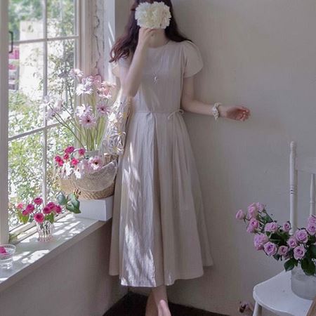 A collection of Dongdaemum Women’s Dresses, encapsulating the charm of Korean fashion.